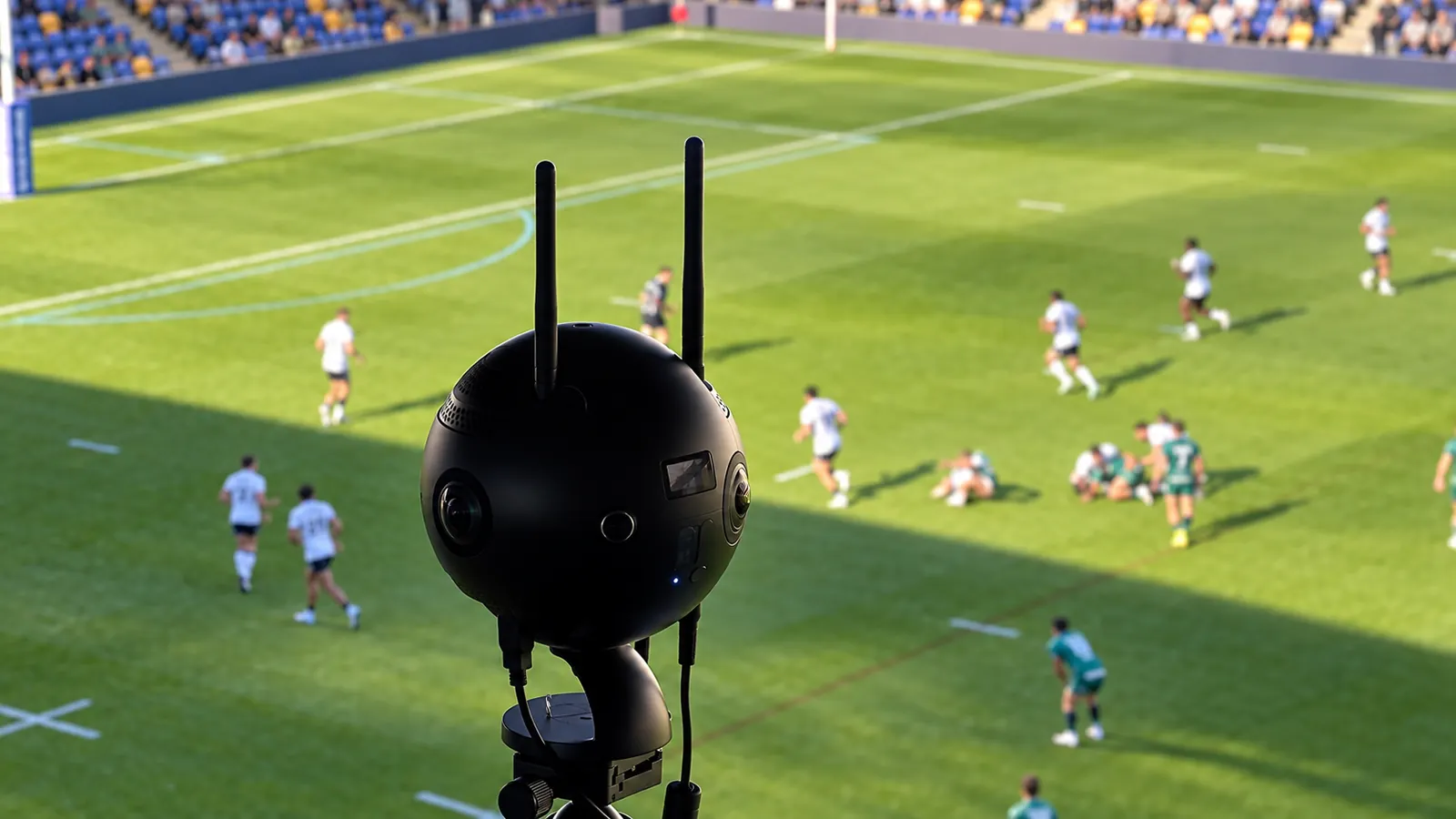 Close-up 360 camera with rugby league players on the pitch behind