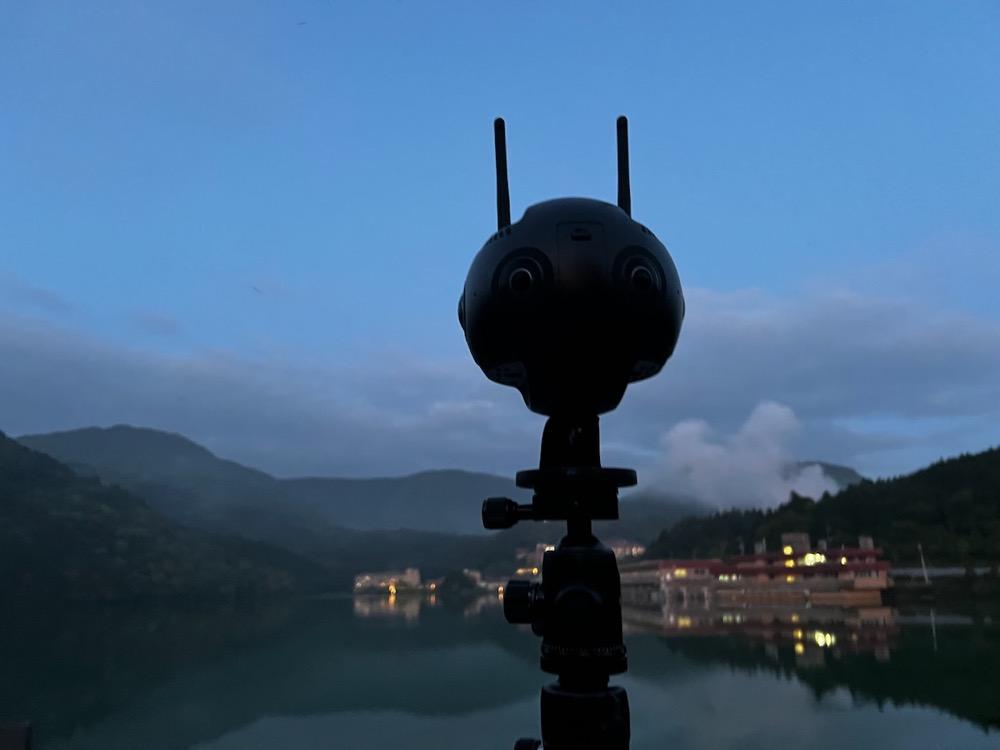 Insta360 Pro 2 silhouetted at dusk over a Kyushu lake, Japan